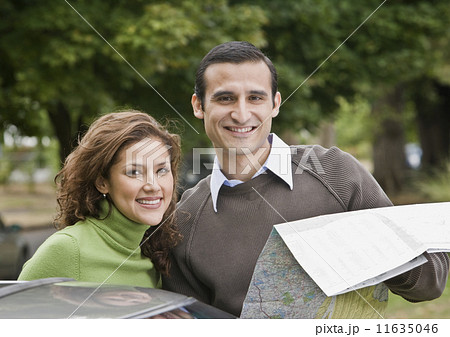 Hispanic couple with map Hispanic couple with map 11635046