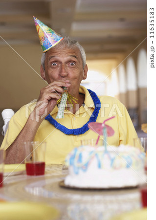 Senior man celebrating birthday Senior man celebrating birthday 11635183