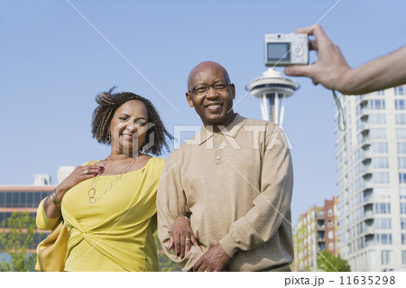 African American couple having photograph taken African American couple having photograph taken 11635298