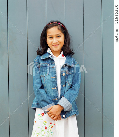 Portrait of young girl smiling 11635320