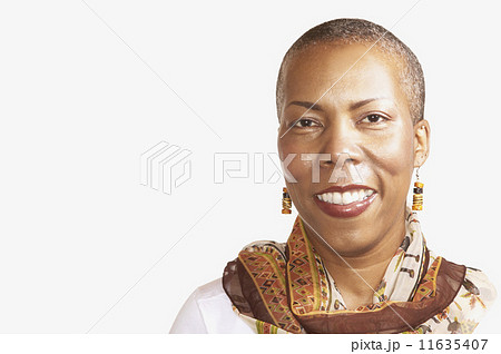 Studio shot of middle-aged African woman smiling 11635407