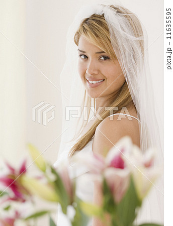 Portrait of Hispanic bride 11635595