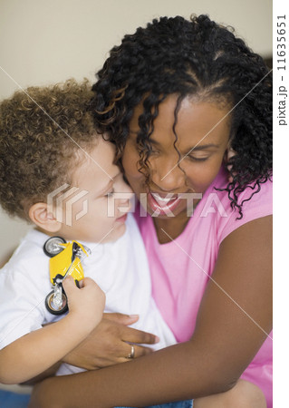African mother hugging child 11635651