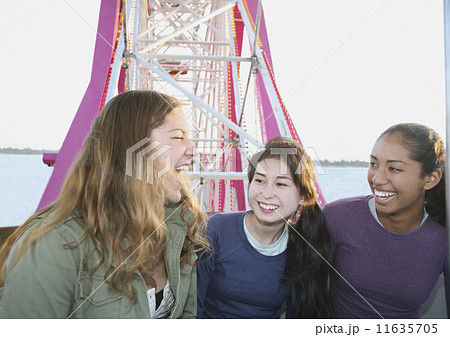 Multi-ethnic girls on Ferris wheel 11635705