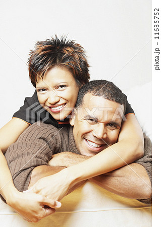 Young couple smiling for the camera 11635752