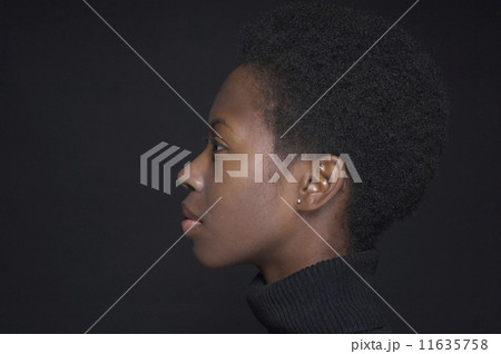 Profile of African woman wearing turtleneck 11635758