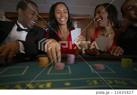 Multi-ethnic couples gambling Multi-ethnic couples gambling 11635827