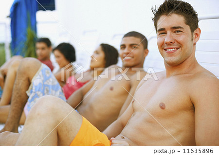 Young man in lounge chair Young man in lounge chair 11635896