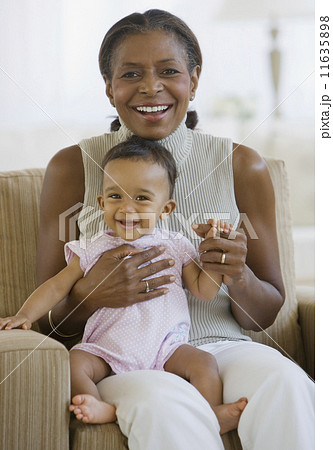 African American grandmother holding baby African American grandmother holding baby 11635898