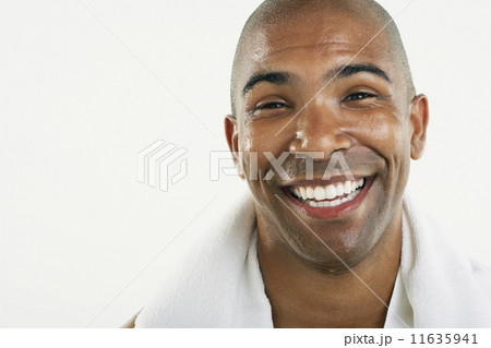African American man with towel around neck 11635941