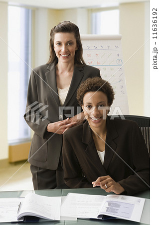 Multi-ethnic businesswomen at table 11636192