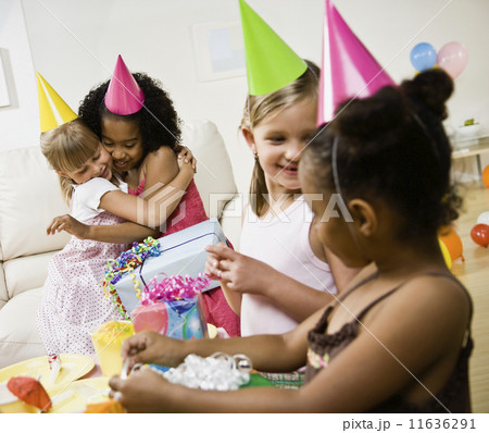 Multi-ethnic girls at birthday party Multi-ethnic girls at birthday party 11636291