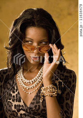 Portrait of African woman wearing sunglasses 11636479