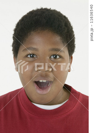 African boy with mouth open 11636540