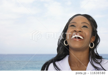 African American woman laughing 11636580