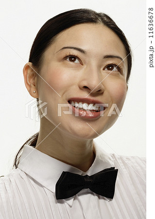 Studio shot of Asian woman smiling 11636678