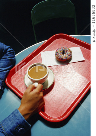 Overhead view of coffee and donut Overhead view of coffee and donut 11636932