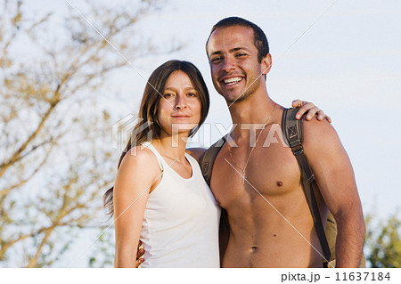 Hispanic couple hugging 11637184