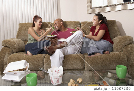 Multi-ethnic friends eating take out food Multi-ethnic friends eating take out food 11637236
