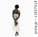 Young woman contemplating book 11637418