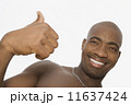 African man giving thumbs up 11637424