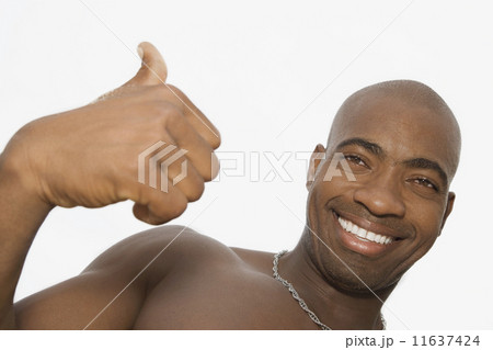 African man giving thumbs up African man giving thumbs up 11637424