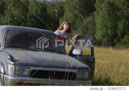 Girl and SUV Girl and SUV 11641571