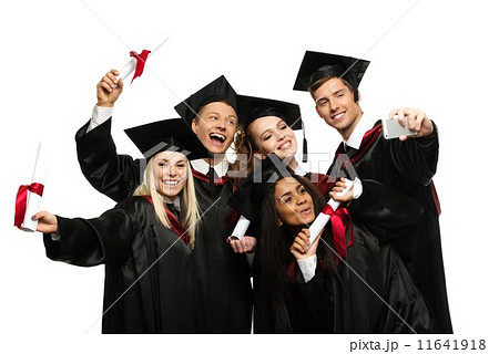 Multi ethnic group of graduated young students isolated on white 11641918