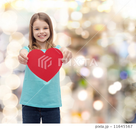 smiling little girl giving red heart smiling little girl giving red heart 11645567