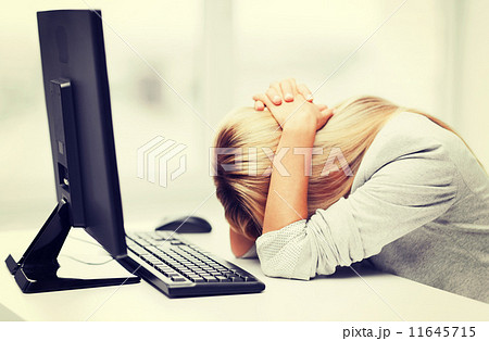 stressed woman with computer stressed woman with computer 11645715