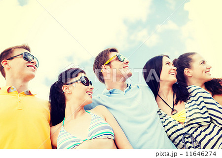 group of friends having fun on the beach group of friends having fun on the beach 11646274