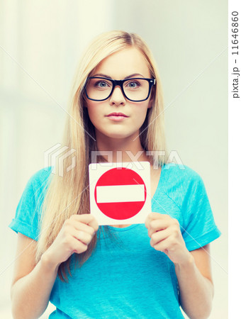 woman with no entry sign 11646860