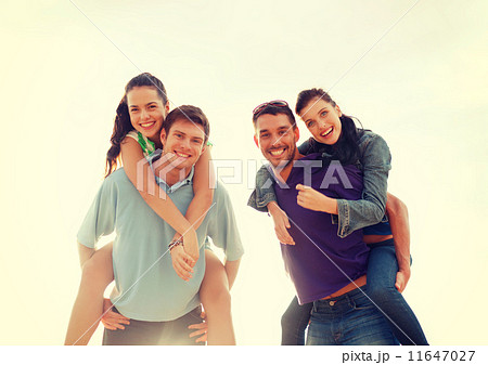 group of smiling people having fun on the beach group of smiling people having fun on the beach 11647027