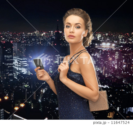 woman in evening dress with vip card woman in evening dress with vip card 11647524