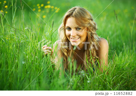 blonde on grass blonde on grass 11652882