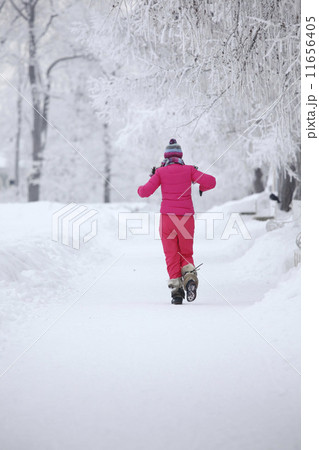 woman in winter park woman in winter park 11656405