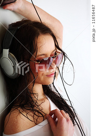 woman in phones 11656487