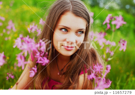 woman on summer flower field 11657279