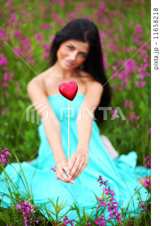 woman on summer flower field 11658218