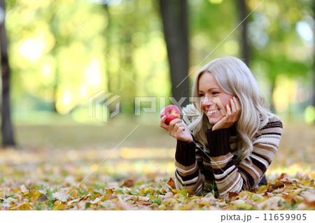 woman with red apple woman with red apple 11659905
