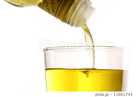 Pouring olive oil Pouring olive oil 11661741