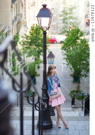 Beautiful girl in pink dress on Montmartre 11676122
