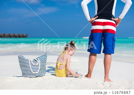 Father and daughter at beach Father and daughter at beach 11676887