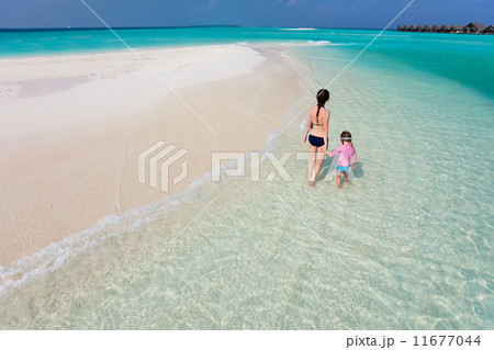 Mother and daughter at tropical beach Mother and daughter at tropical beach 11677044