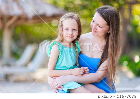 Mother and daughter 11677078