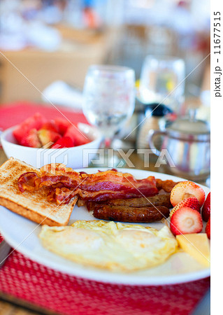 Breakfast with fried eggs 11677515