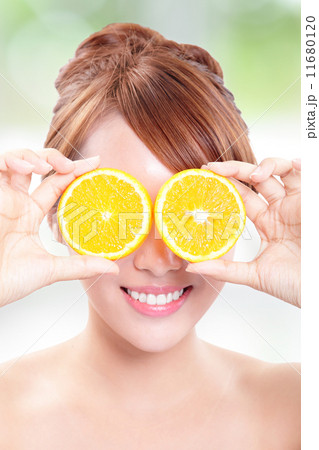 Beautiful woman face with juicy orange 11680120