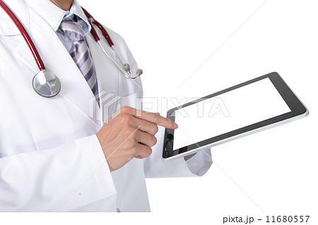 doctor with stethoscope showing blank tablet pc 11680557