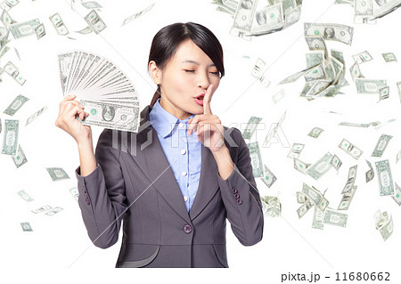 woman finger on lips asking quiet with money 11680662