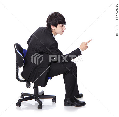 businessman sit and finger point copy space 11680895